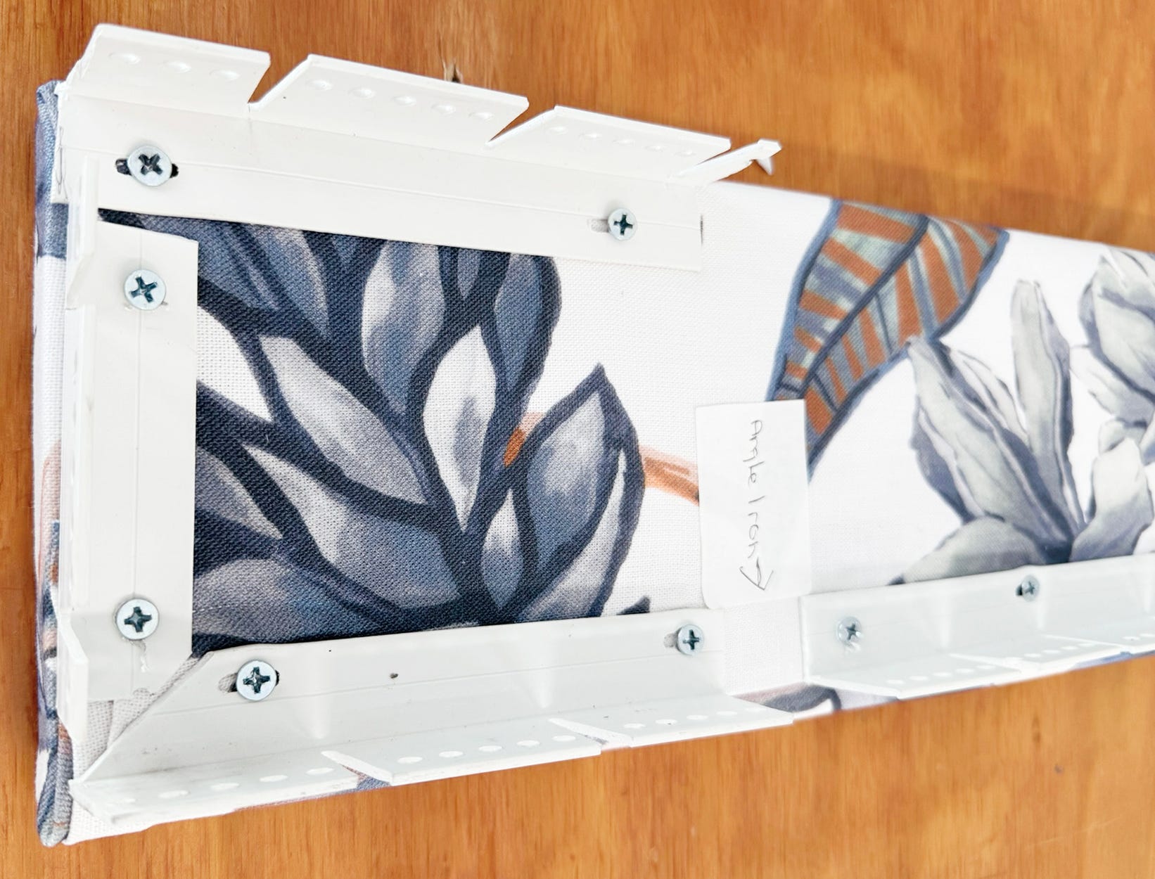 Close-of right-angle bed strip on bed valance board for easy installation.